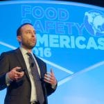 Evan Rosen Vice President of QA at PacMoore Speaking on stage at a Food Safety Americas Conference in 2016