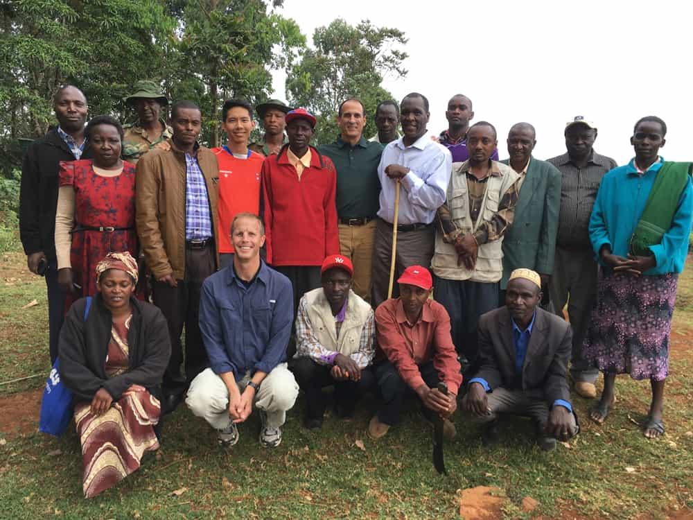 Bill Moore Scott Pothoven Jacob Wheeler PacMoore in Kenya with local farmers