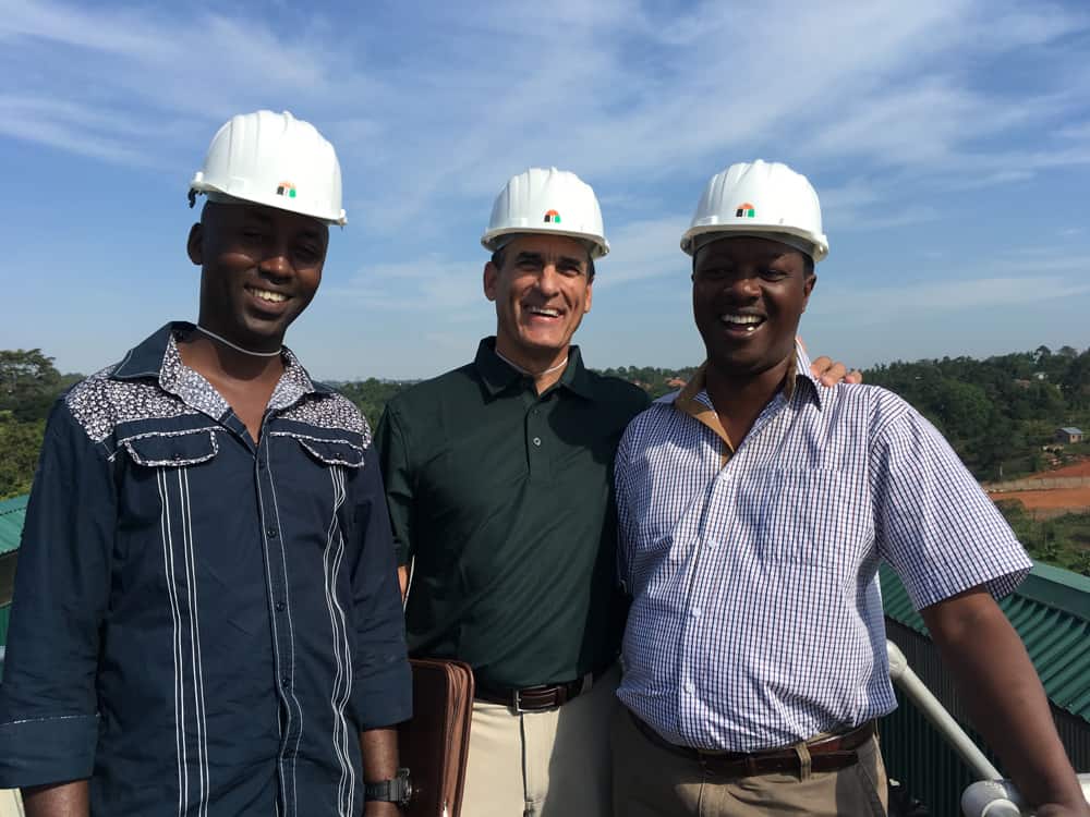 Bill, Innocent and Peter, the general manager at Savanah grain processing facility. 